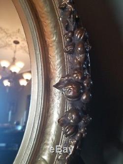 Bombay Antique Gold Gilt Oval Wall Mirror with large frame 29x25