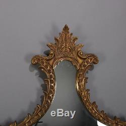 Large French Louis XV Giltwood Shaped and Foliate Wall Mirror, circa 1930