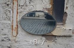 Large Thick Brass Framed Art Deco Oval Bevel Edged Wall Mirror With Flower Top