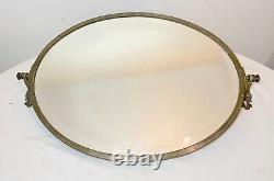 Large antique industrial style brass pivoting vanity oval beveled wall mirror