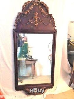 Large mid-century ornate mahogany and gold trim wall mirror