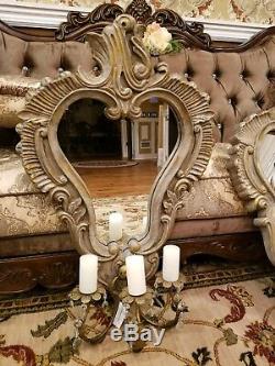 Mirrored wall candle sconce